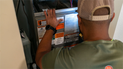 Air conditioning installation in Plant City Florida - HVAC technician installing new AC system for residential home